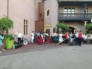 Folklore dancing in the evening at Colmar, Alsace (France)